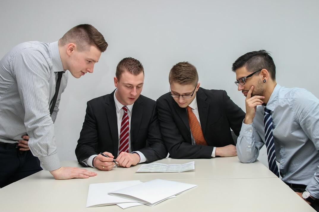 people discussing in meeting