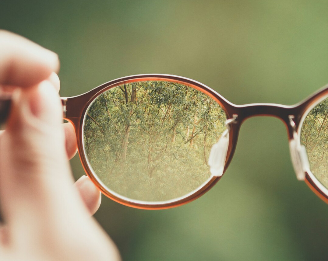 Brazilian man researcher in emotional intelligence with glasses
