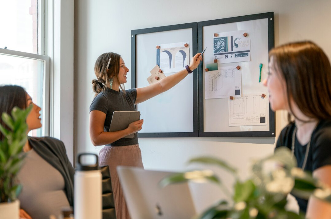 woman explaining ideas in group
