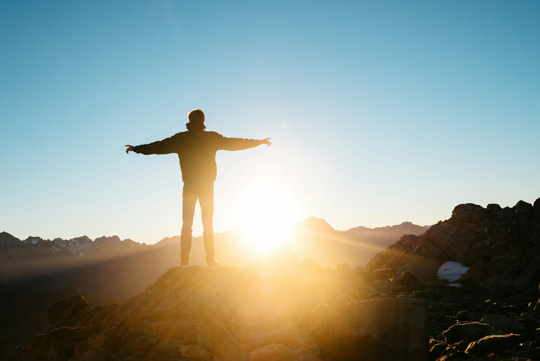 person achieving goals success